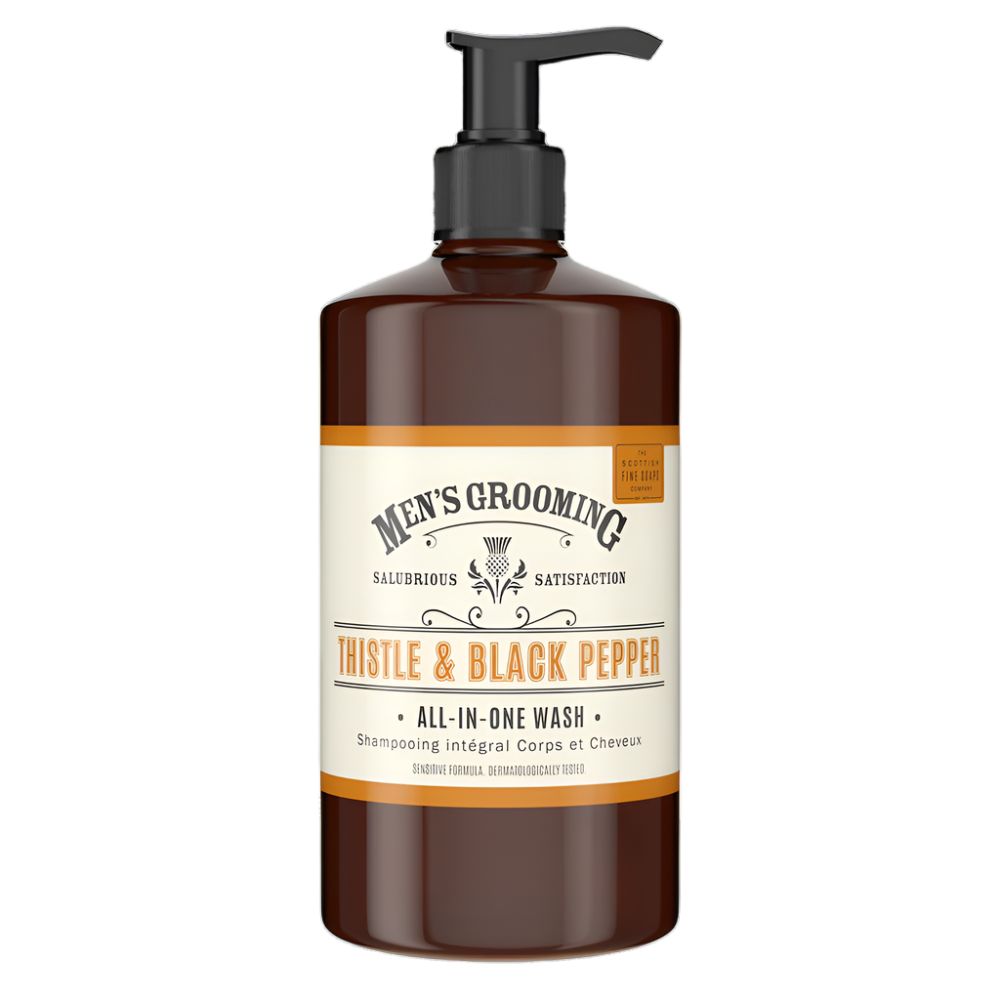 The Scottish Fine Soaps Men's Grooming Thistle & Black Pepper All-In-One Wash 500ml in a stylish amber pump bottle with vintage-inspired label design.