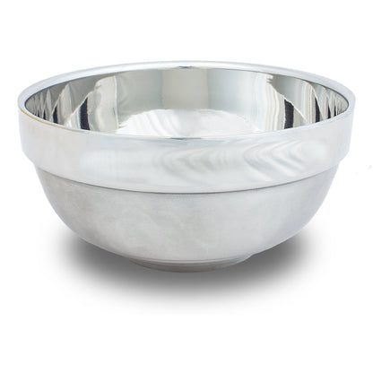 A side profile of The Bluebeards Revenge Stainless Steel Shaving Bowl, displaying its robust, deep, and polished design ideal for barbershop or home use.