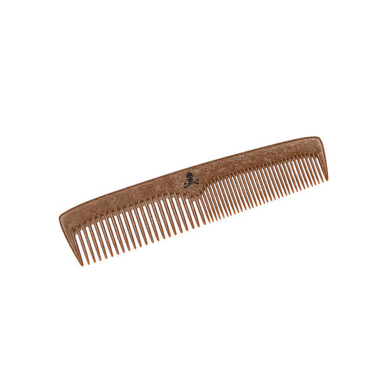 Compact version of The Bluebeards Revenge Liquid Wood Comb, showcasing its dual teeth design and sustainable, biodegradable material.