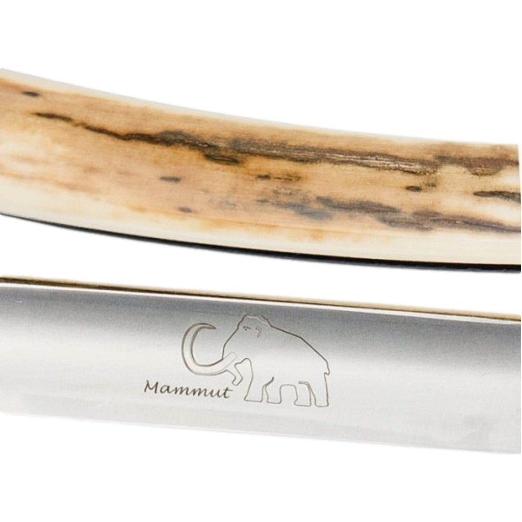 Close-up of the Dovo Mammoth Ivory Straight Razor blade with engraved Mammoth logo and ivory handle.