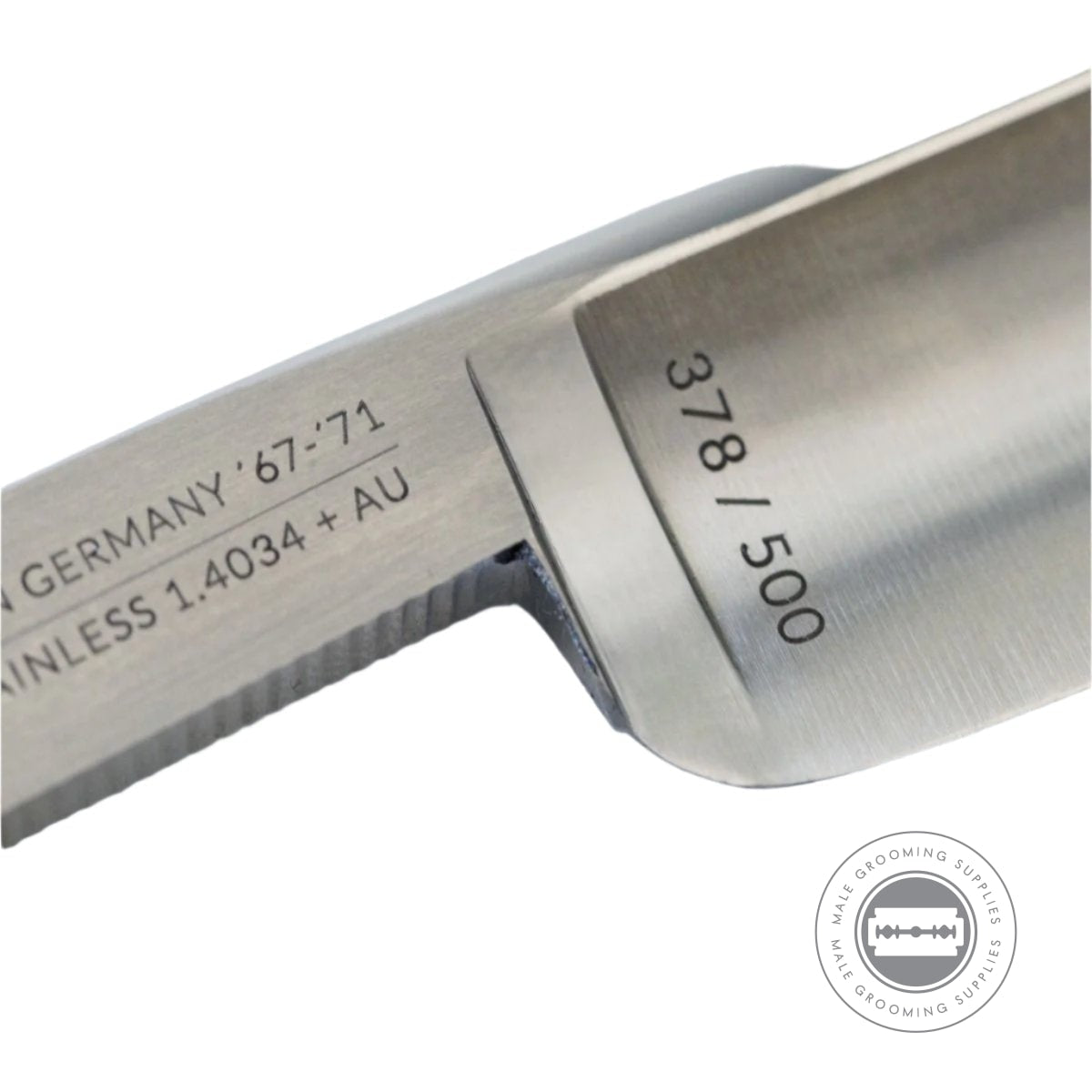 Engraved serial number and detailed engraving on the Dovo Facharbeit razor blade.