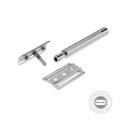 Dovo PRIMO I Safety Razor disassembled into three parts – handle, razor head, and blade guard.