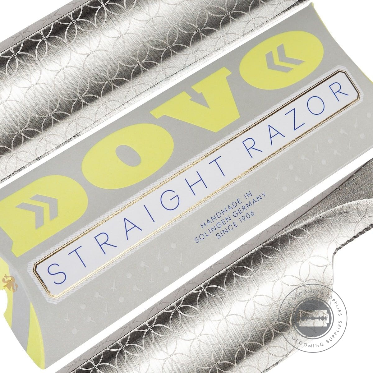 Detailed view of Dovo Runde Sache straight razor packaging design featuring gold and blue accents.