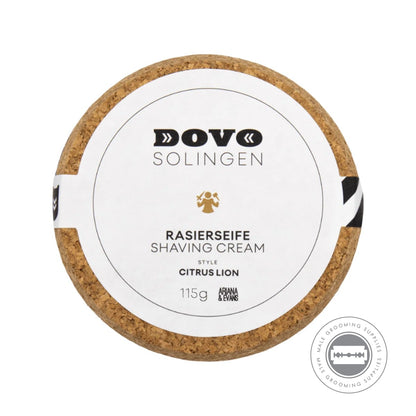 Top view of Dovo Shaving Soap in Ceramic Bowl - Citrus Lion, highlighting the logo and product details on the cork lid.