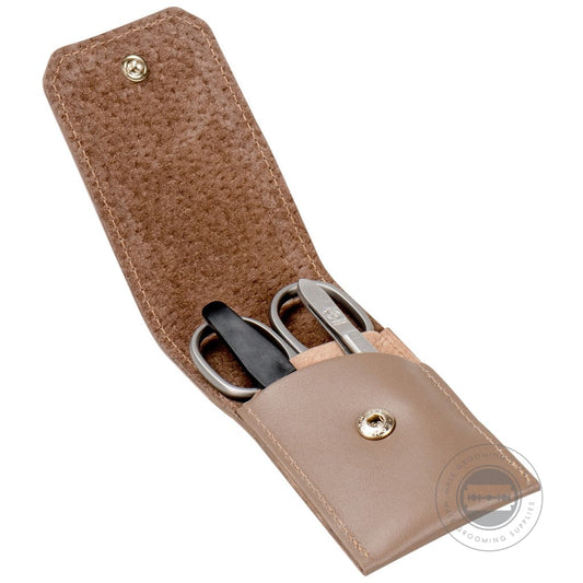 Dovo Taupe Leather Manicure Set open showing three stainless steel tools inside.