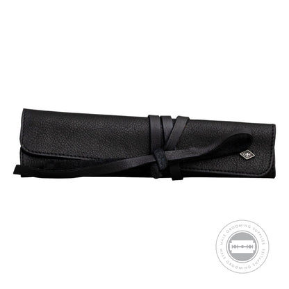 G&F Timor® Black Leather Roll-Up Razor Case fully rolled and secured with a leather strap.