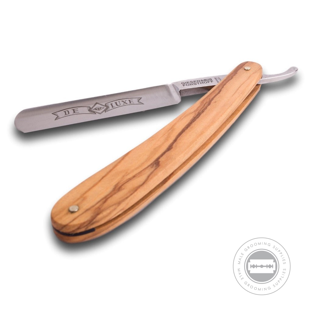 G&F Timor® Deluxe Razor 5/8 with olive wood handle and carbon steel blade, displayed at an angle.