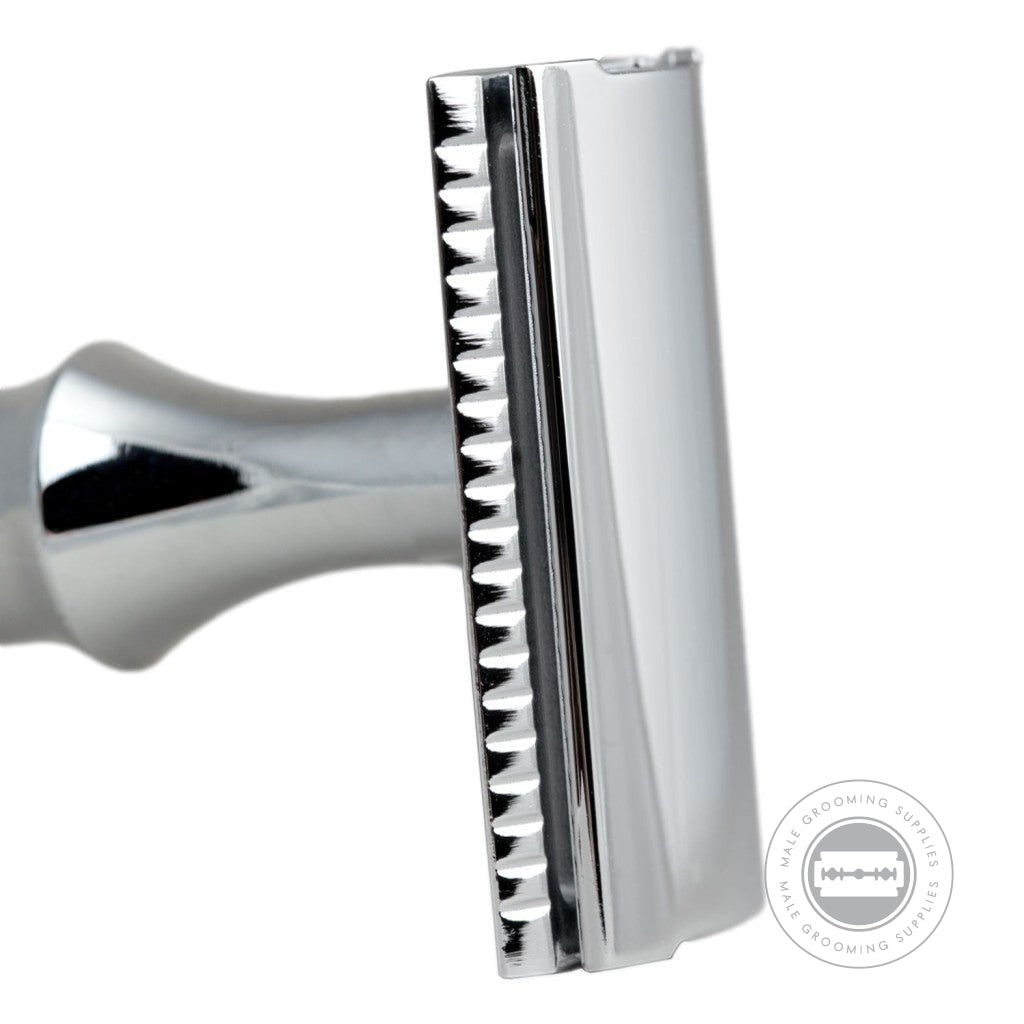 Close-up of the chrome-plated head of the G&F Timor® Safety Razor 1920, highlighting its smooth finish.