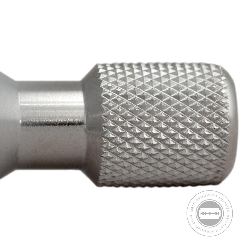 Detailed view of the knurled stainless steel handle on the G&F Timor® Safety Razor 1920 for enhanced grip.