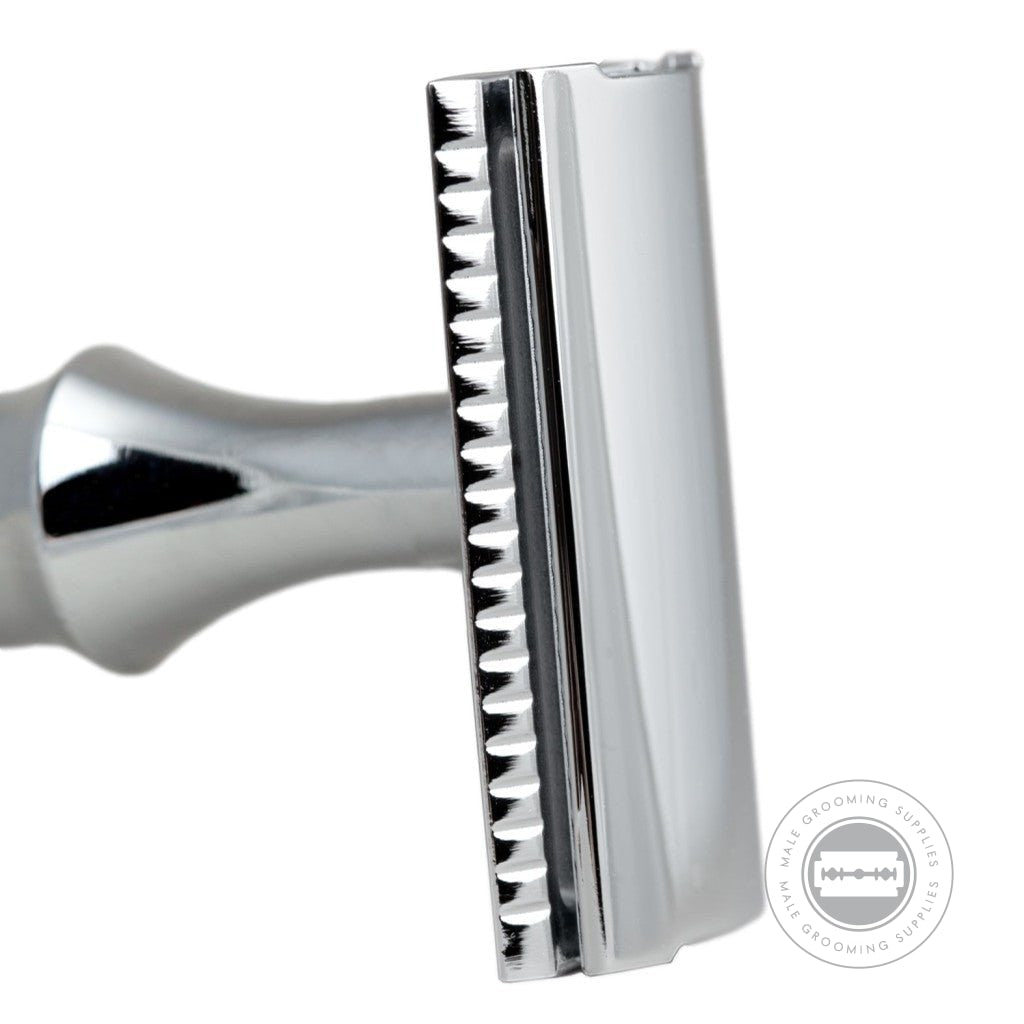 Close-up of the chrome-plated head of the G&F Timor® Safety Razor 1920 with Oak Handle, highlighting its smooth finish.