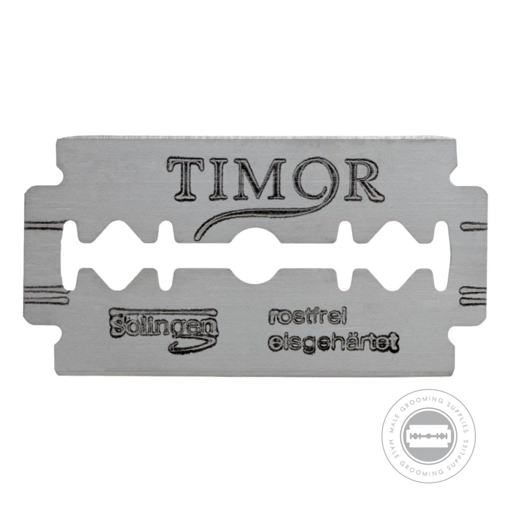 Close-up of a Timor® razor blade, showcasing Solingen craftsmanship and engraved branding.