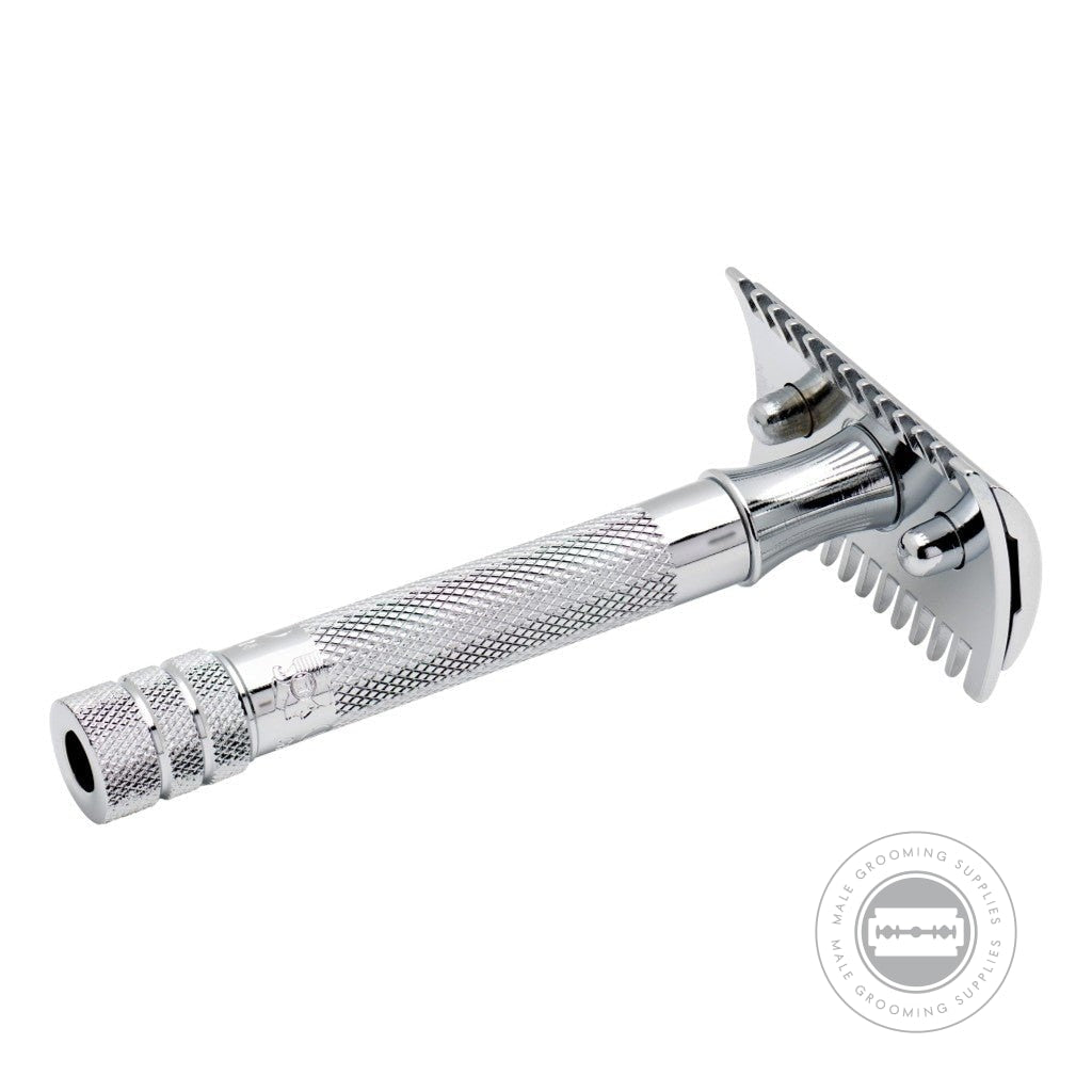 Side view of the Merkur Razor 15001, highlighting the open comb head and sturdy short handle, ideal for precise shaving.