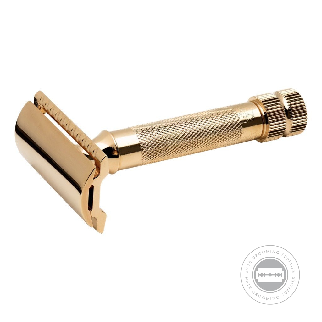 Close-up of Merkur 34003 Gold-Plated Safety Razor with gold-finished handle and closed comb head.