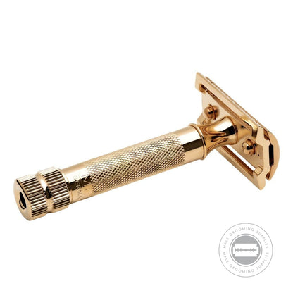 Side view of Merkur 34003 Gold-Plated Safety Razor with handle in front, showcasing the underside of the razor head.