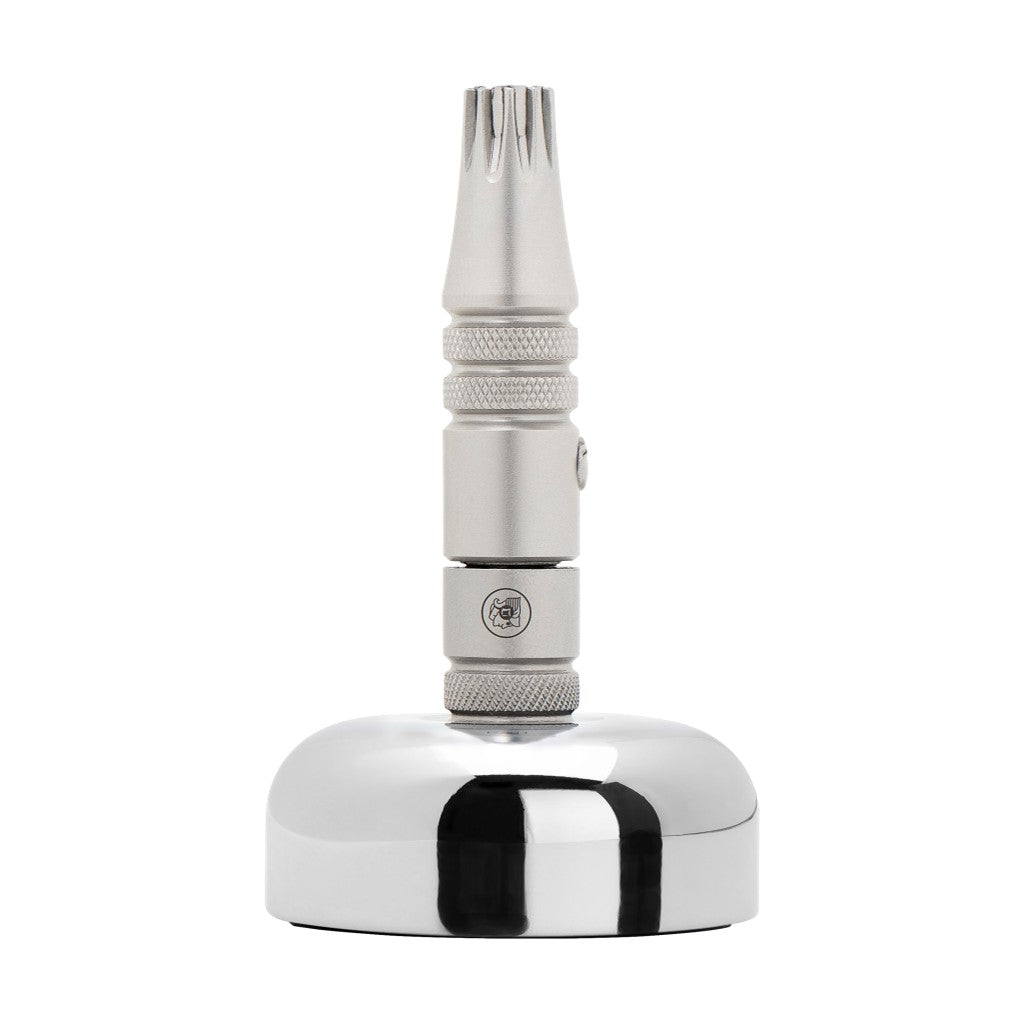 Merkur Nose Hair Trimmer 6001 elegantly displayed on a chrome stand for organized grooming.