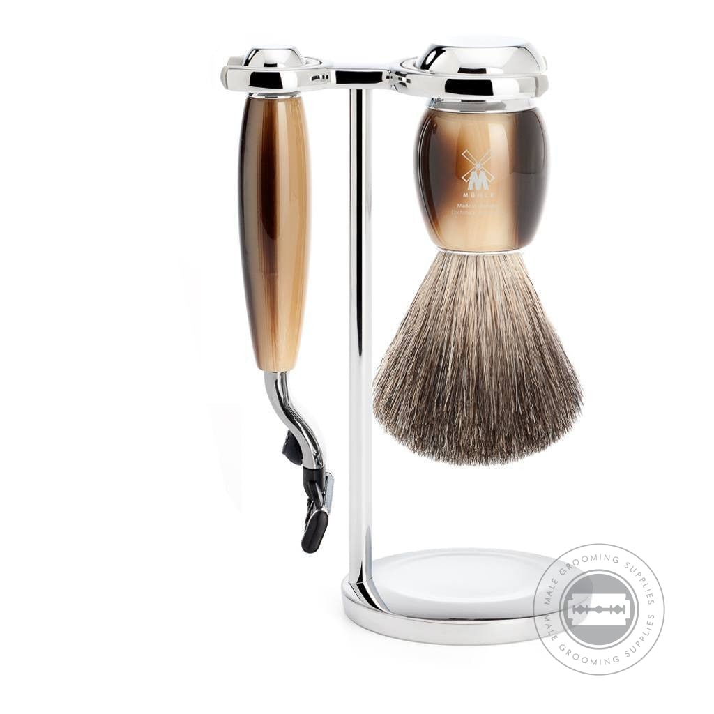 Muhle 3-Piece M3 Shaving Set from the VIVO series, featuring Pure Badger brush, Mach3® razor, and chrome-plated stand with horn brown resin handles.