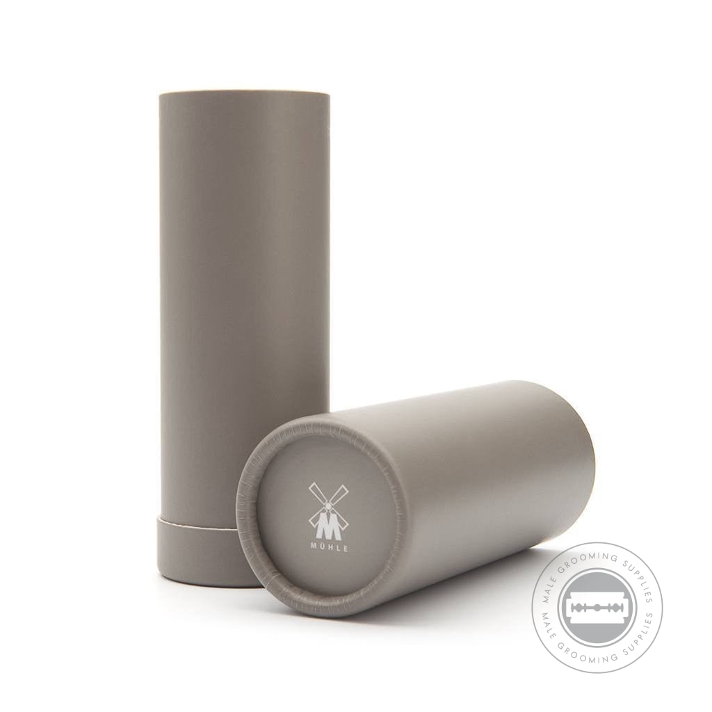 Grey cardboard tube packaging for the Muhle Classic Silvertip Fibre® Shaving Brush, featuring the engraved Muhle logo on the base.