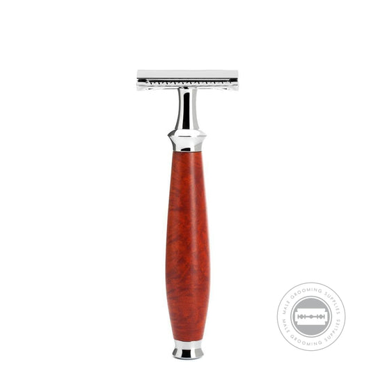 MÜHLE Purist Safety Razor with a briar wood handle and chrome-plated metal highlights, standing vertically to showcase its sleek design.