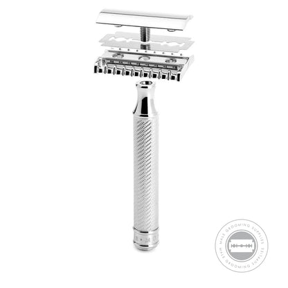 Close-up view of the dismantled Muhle R41 Safety Razor, showcasing its chrome-plated open comb razor head and handle.