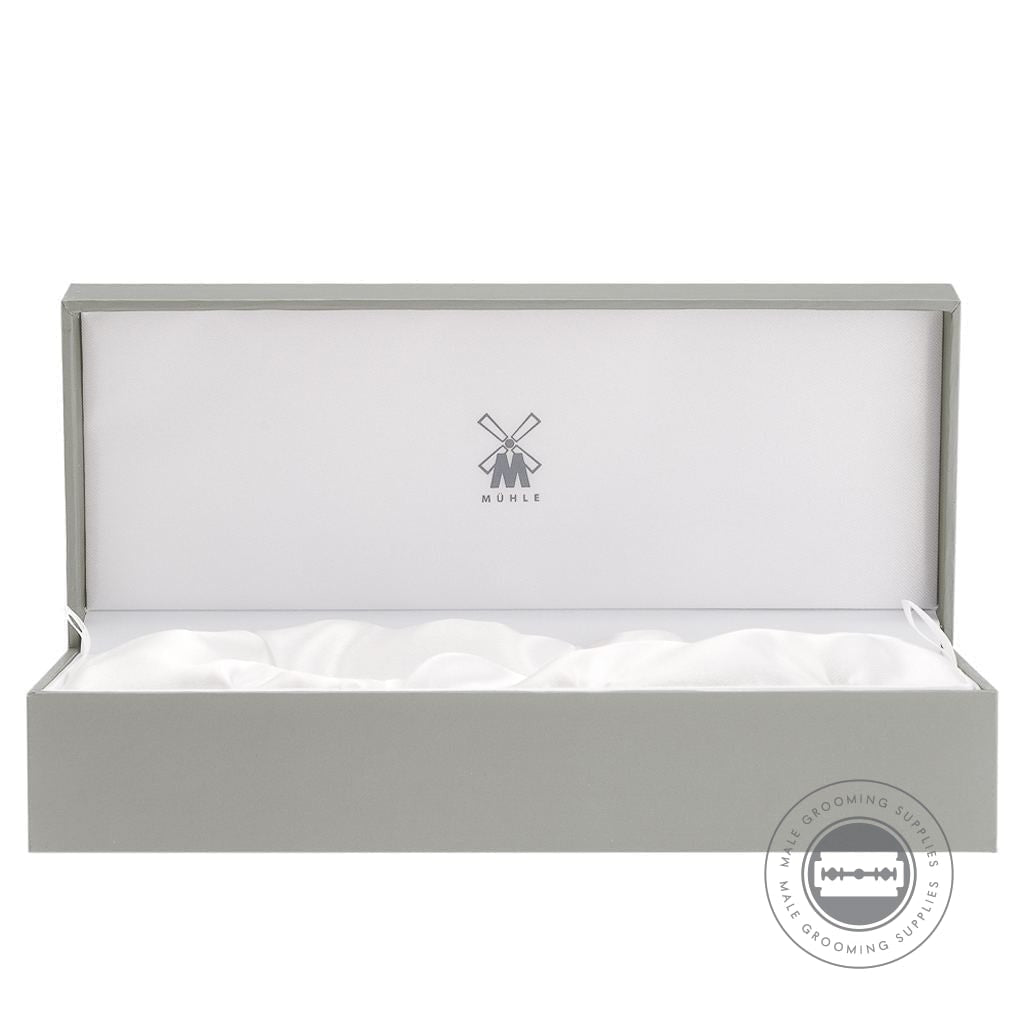 Elegant Muhle promotional gift box with a satin lining, ideal for presenting Muhle shaving brushes and razors.