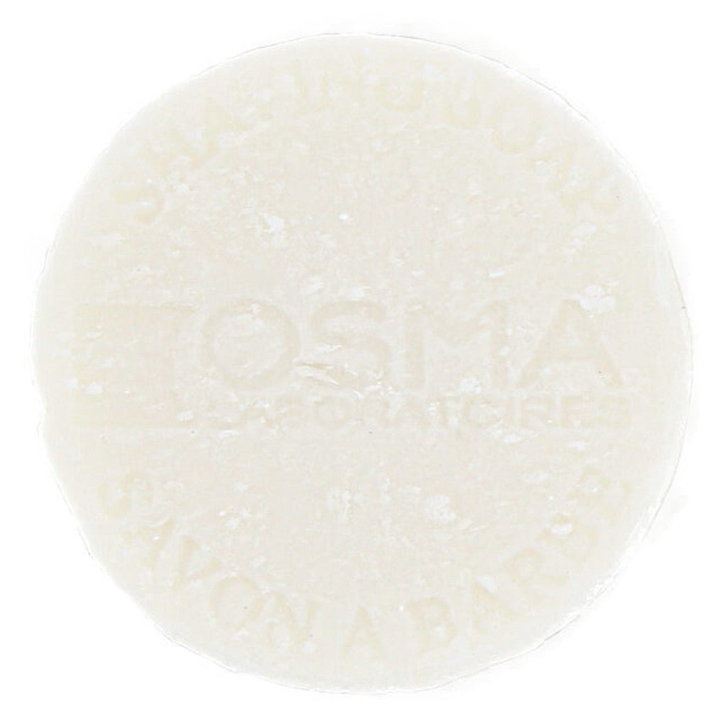 A picture of Osma Shaving Soap 100g  featuring natural ingredients like kaolin and shea butter, made in France.