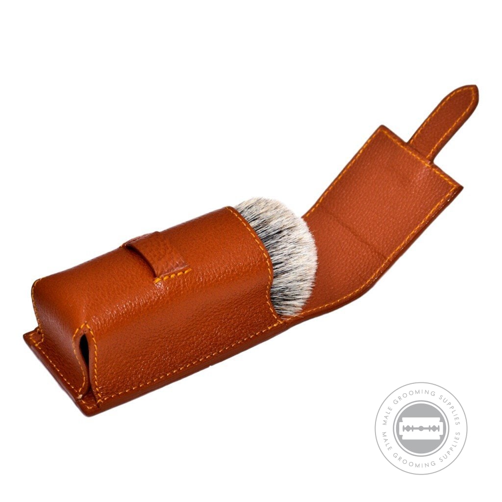 Saddle brown Parker shaving brush case with a shaving brush partially inserted, showcasing secure protection for bristles and handle.